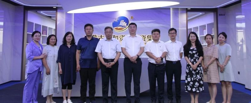 Leaders and teachers from the Senior Management Education Center of Inner Mongolia University visited Xinhe Resources for discussion and guidance
